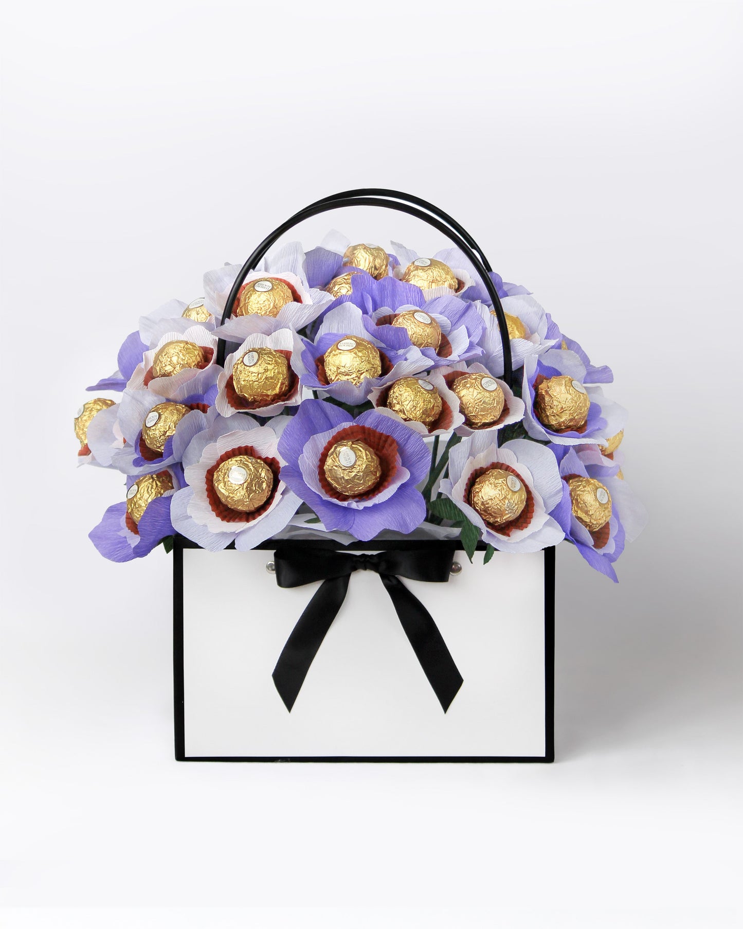 Custom gift bouquet featuring whimsical purple blooms with chocolate centres