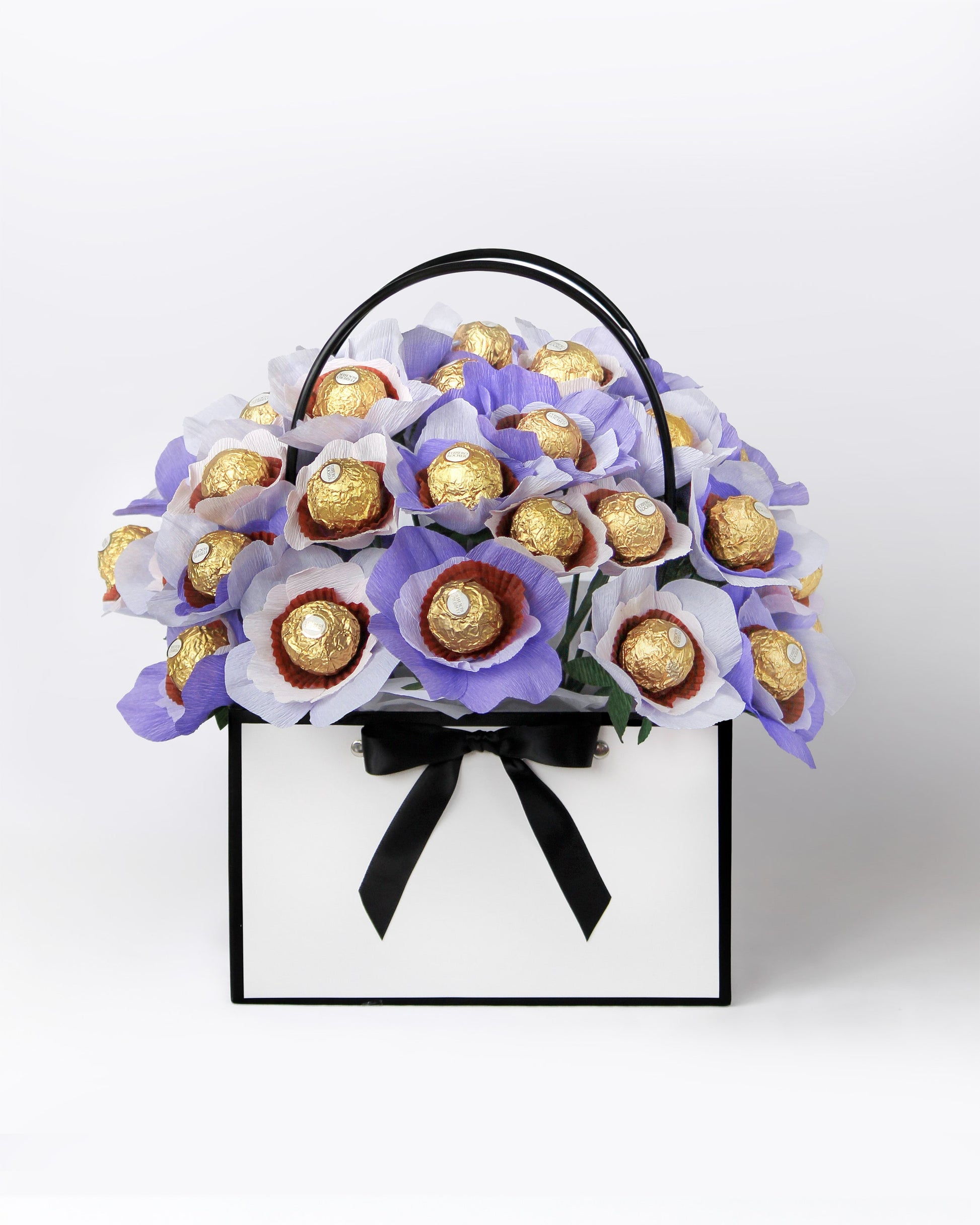 Custom gift bouquet featuring whimsical purple blooms with chocolate centres