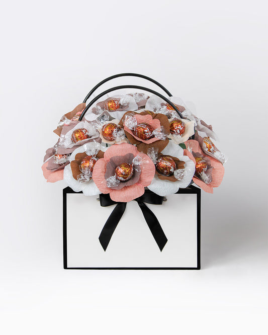 Tiramisu-inspired chocolate bloom box with espresso brown, creamy mascarpone, and cocoa chocolate-centred flowers – handmade and personalised gift