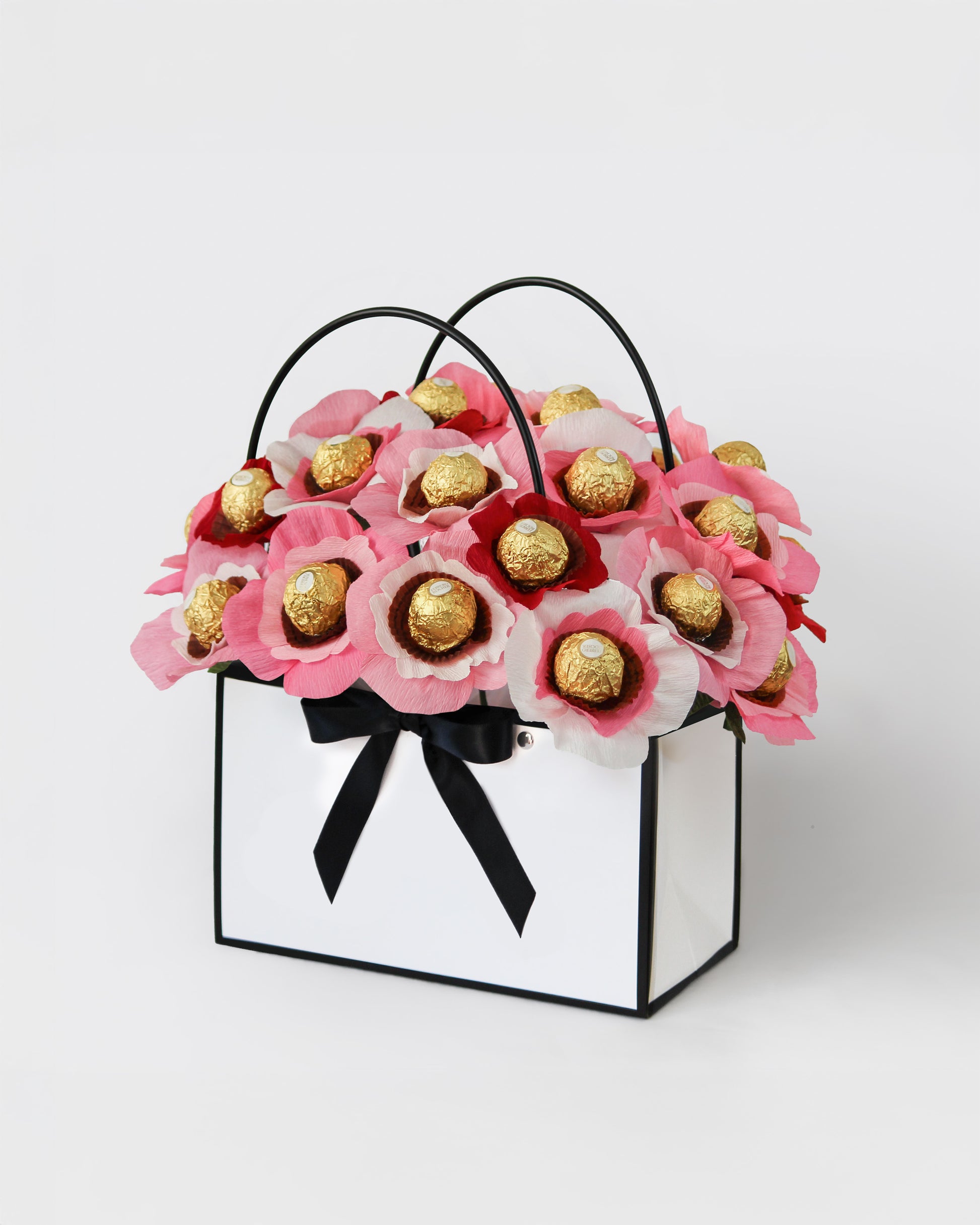 Handmade chocolate bouquet in dusty pink and faded rose tones