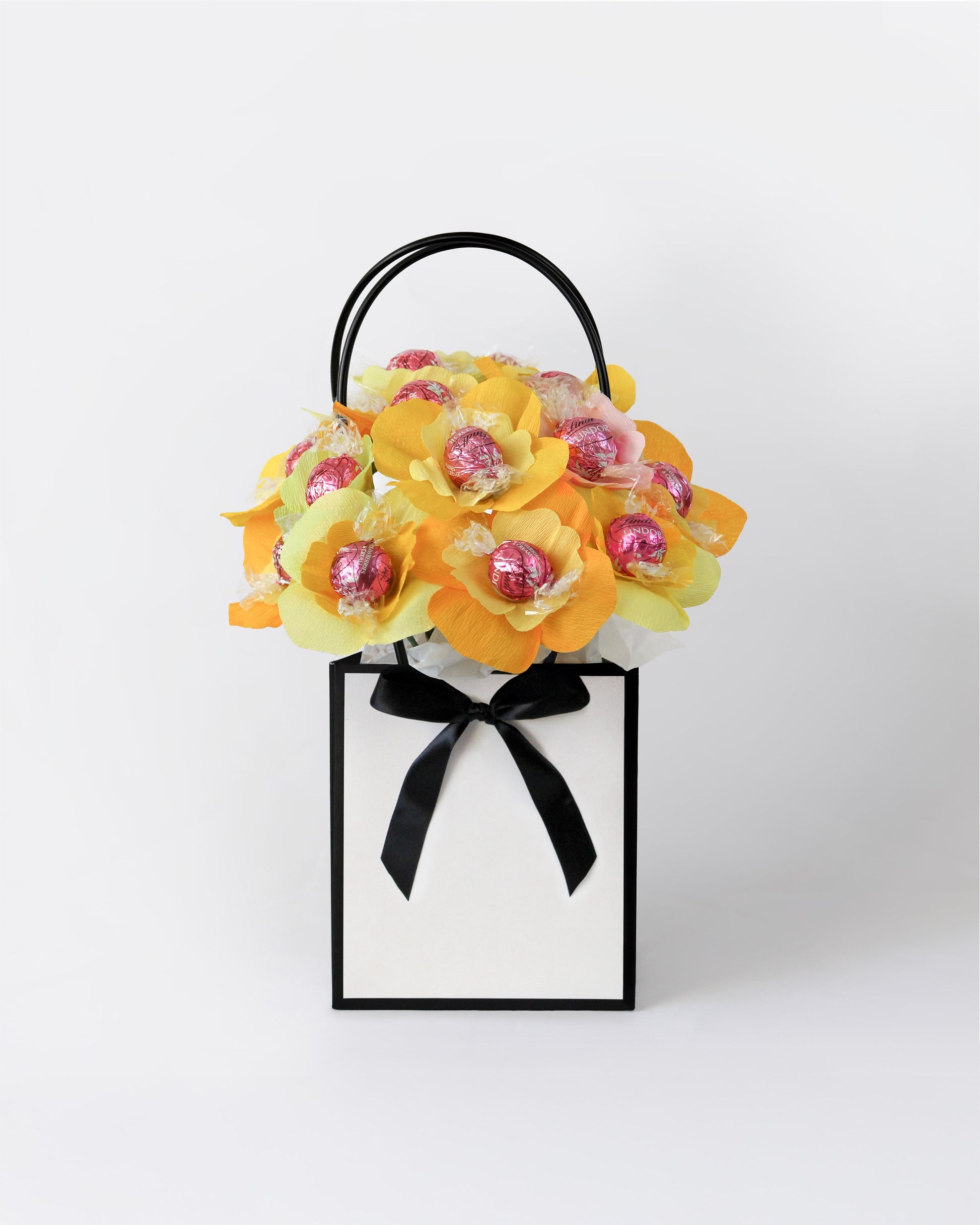 Spring-inspired floral gift box with sweet honey-coloured blooms