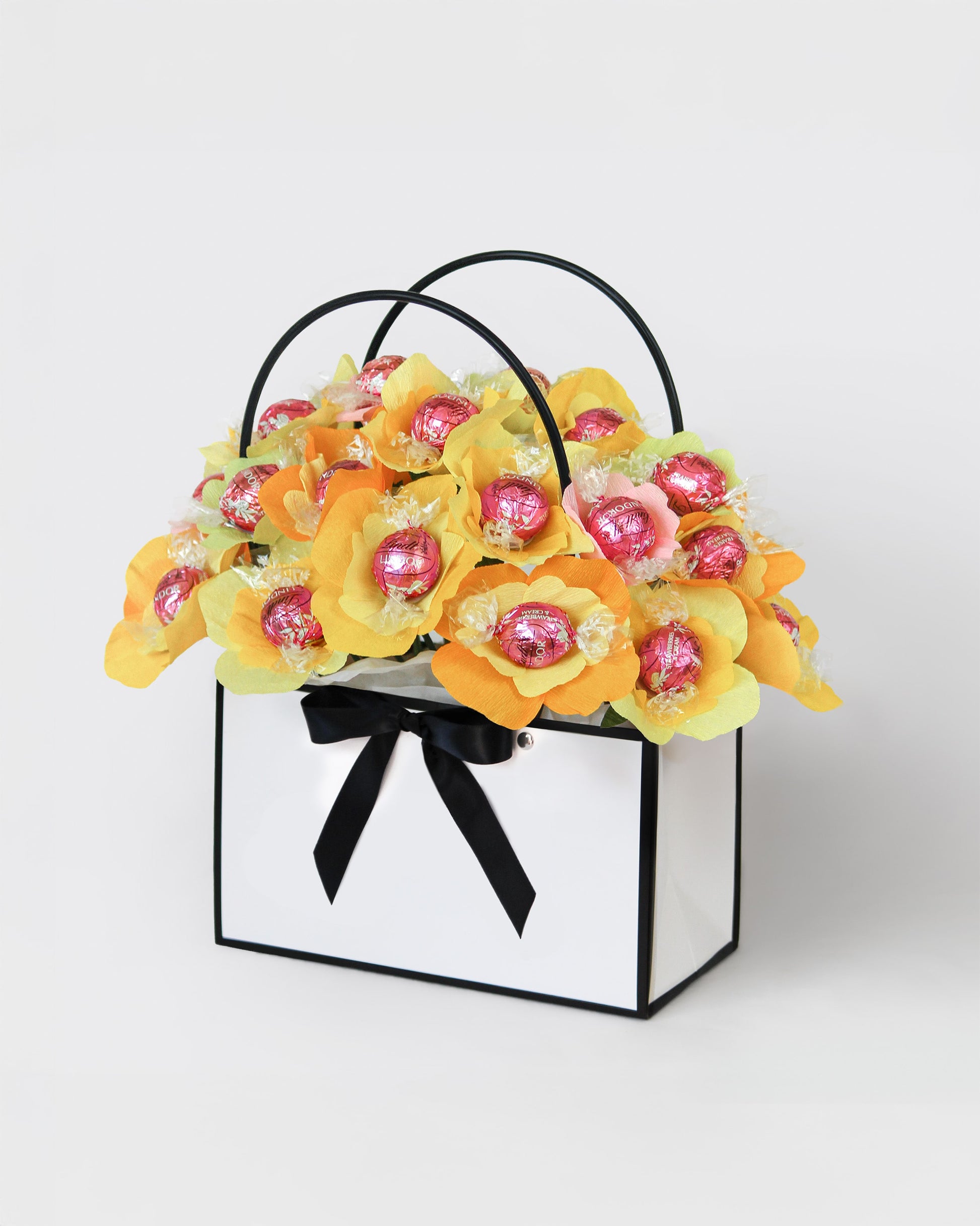 Radiant chocolate flower bouquet in golden yellow and soft peach
