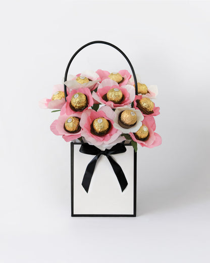Handmade chocolate bouquet featuring vibrant raspberry and fresh lemonade tones