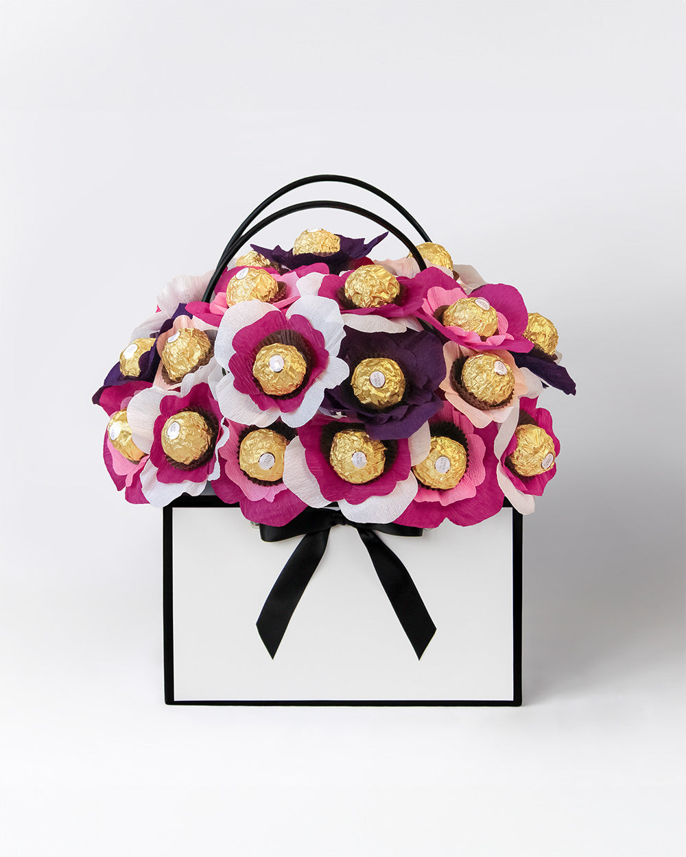 Blackberry Cheesecake bloom box with deep berry and cream coloured chocolate flowers